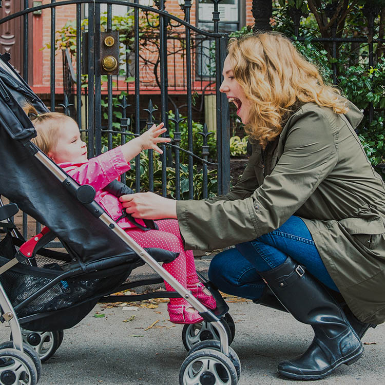 Au Pair and Baby Smiling